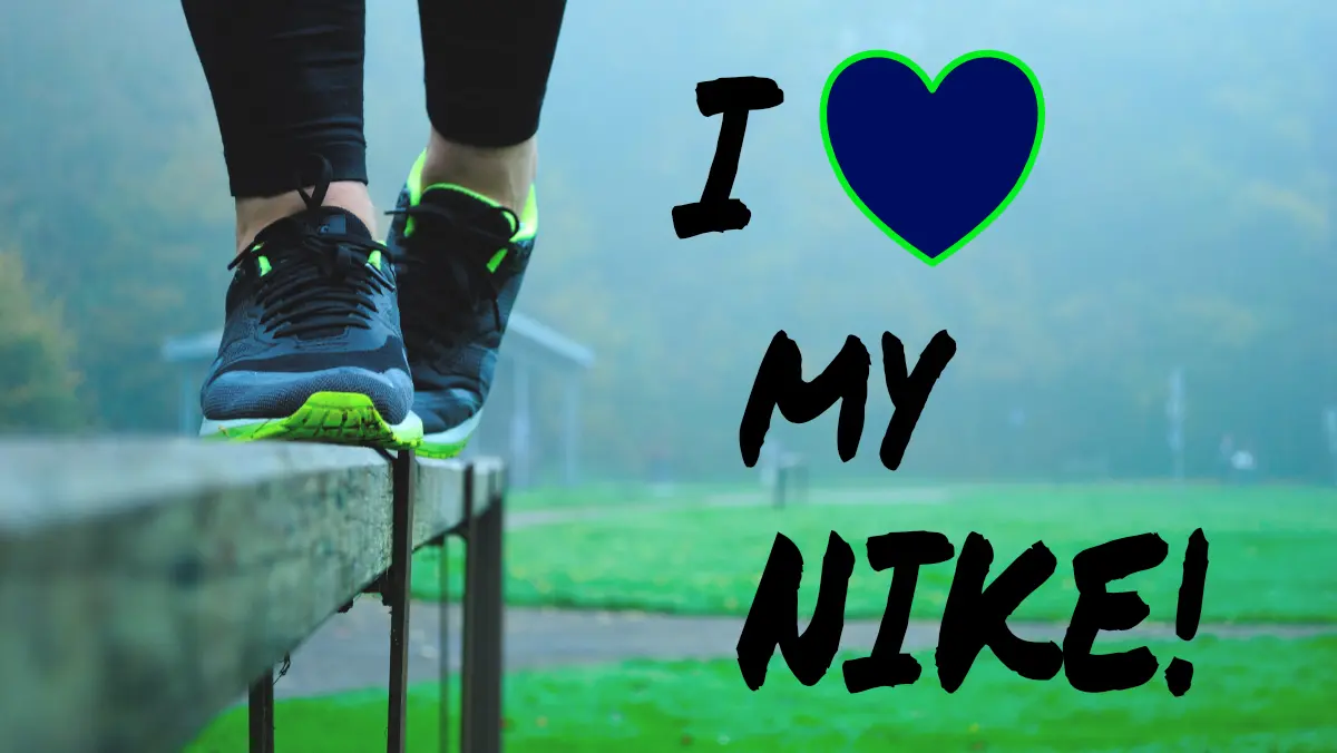 An image of a girl's legs in sneakers balancing on a ledge outside. The words 'I Love my Nike' are written on the image